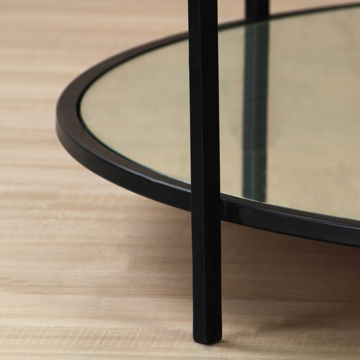 Blend Bench Glass Round Coffee Table In Black Finish